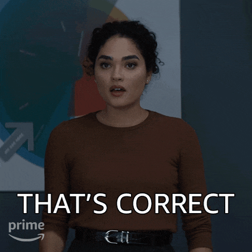 a woman says that 's correct while pointing her finger