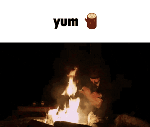 a man in a suit is cutting a piece of wood in front of a fire and the word yum is below him