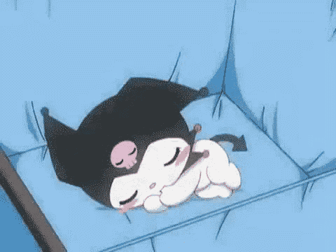 a cartoon cat is laying on a blue couch and talking .