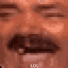 a close up of a man 's face with his eyes closed and the word lol written in the corner .
