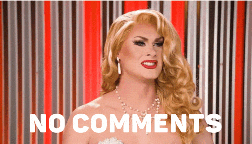 a woman with blonde hair and red lips says " no comments "