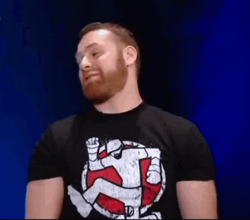 a man with a beard is wearing a black t-shirt with the name sami on it