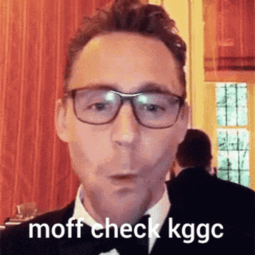 a man wearing glasses and a bow tie says moff check kggc