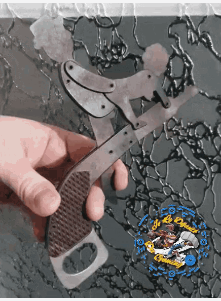 a person is holding a pair of scissors with a picture of a pirate on the bottom right