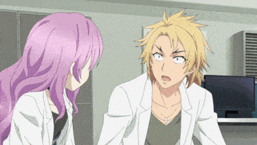a man and a woman are talking in a room