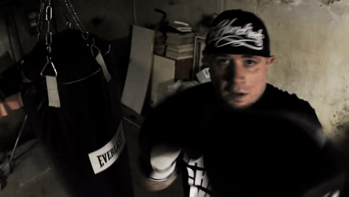 Vinnie Paz Punching GIF - Vinnie Paz Punching Punching Bag GIFs