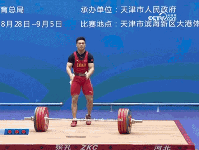 a man in a red shirt that says china on it
