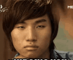 a close up of a young man 's face with a caption that says ' i do n't know '