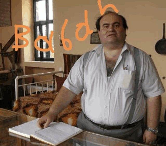 a man in a white shirt and suspenders stands in front of a bed with the word bogda written on the wall