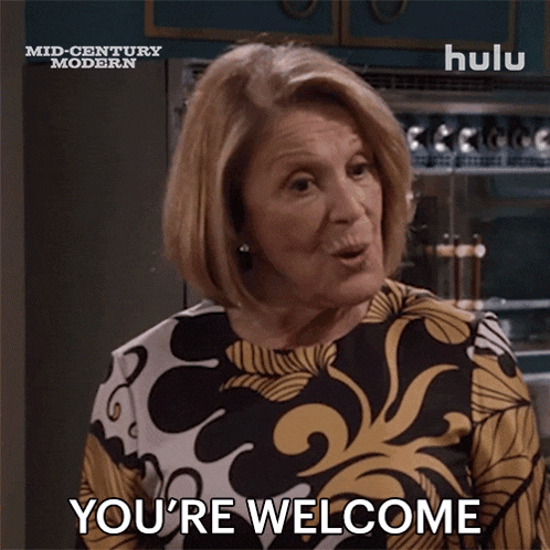 a woman says " you 're welcome " while wearing a floral shirt