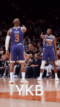 a basketball player with the number 3 on his back is giving a thumbs up