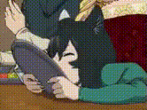 a couple of anime characters are sitting on a table and looking at a tablet .