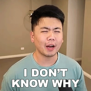 a man in a blue shirt is making a funny face and saying `` i don 't know why '' .