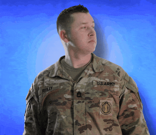 a man in a u.s. army uniform has the name kelly on his chest