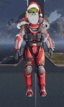 a man in a santa hat is standing in front of a mountain