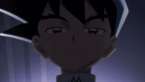 a close up of a cartoon character 's face with a letter w on his shirt