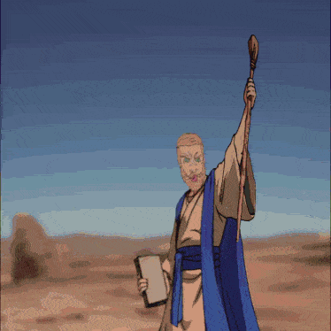 a man in a blue robe is walking across a dirt road