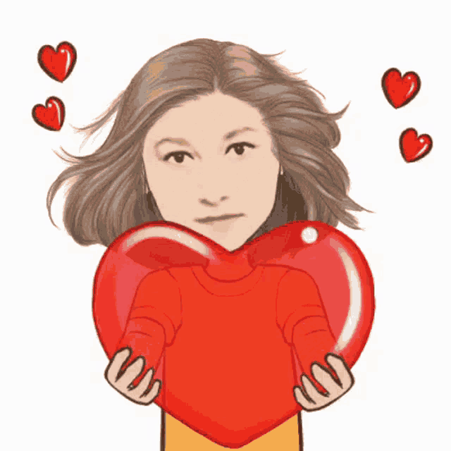 a girl in a red sweater is holding a large red heart in her hands