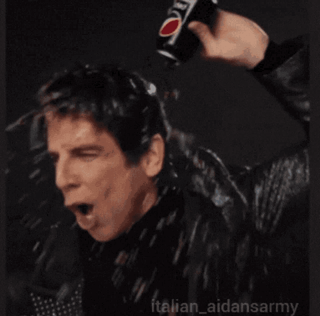 a man holds a can of pepsi zero sugar in front of a pepsi logo