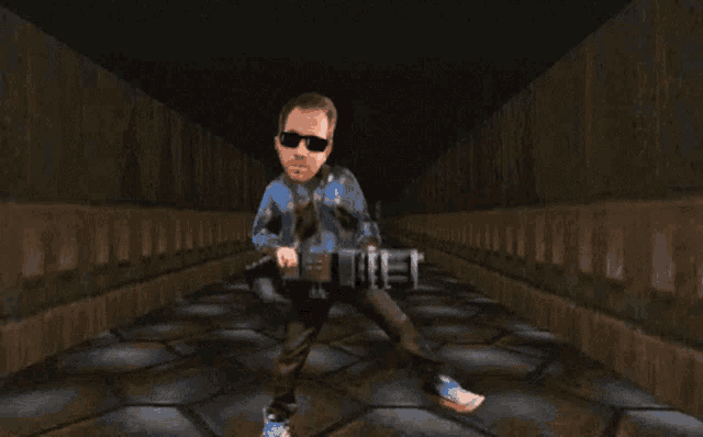 a man in sunglasses is holding a gun in a dark room