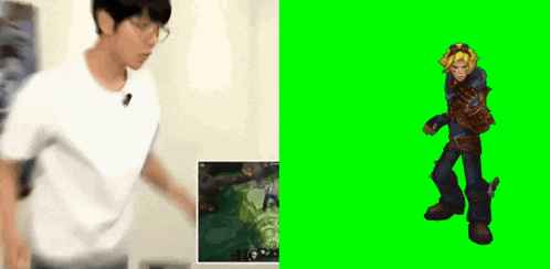 a man in a white shirt is standing next to a green screen with a video game on it .