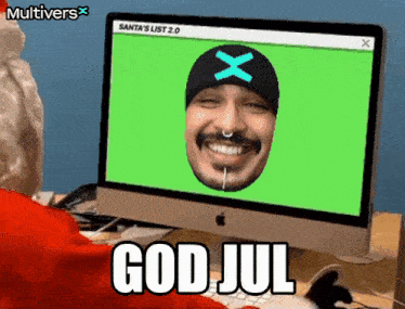 a computer screen shows a man with a nose ring and the words god jul