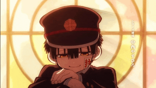 a boy in a hat with chinese writing on it