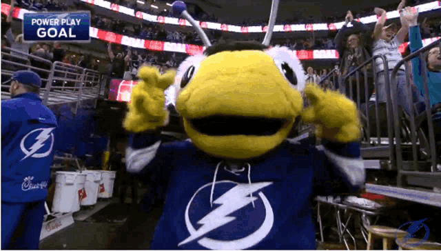 a mascot for the tampa bay lightning is giving a thumbs up sign