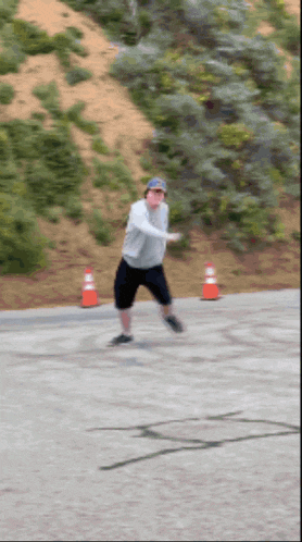 a blurry picture of a person riding a skateboard on a street