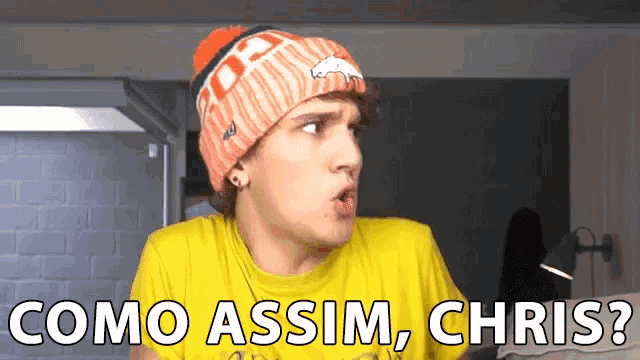 a man wearing a beanie and a yellow shirt is asking " como assim chris "