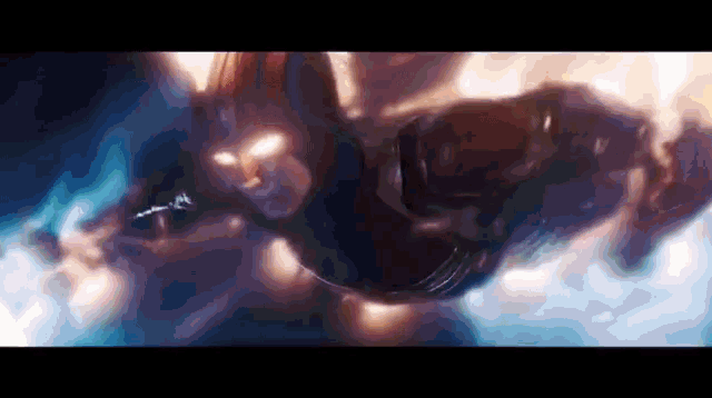 a close up of a person flying through the air in a movie .