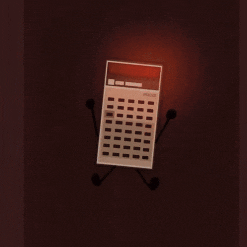 a calculator with arms and legs laying on a dark surface