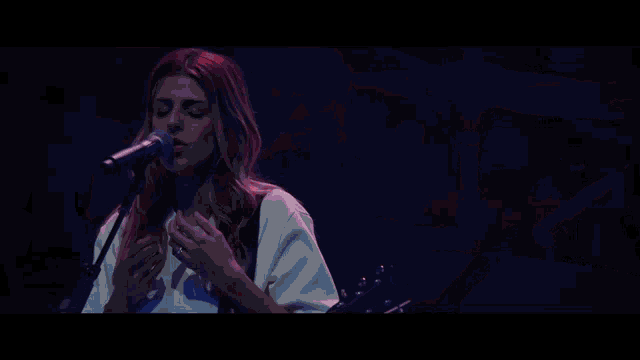 a close up of a person playing a drum set with a cymbal that says ' lp ' on it