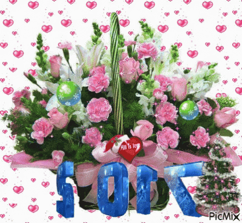 a bouquet of pink and white flowers in a basket with the year 2014 on it