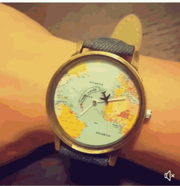 a watch on a person 's wrist that says atlantic on the face