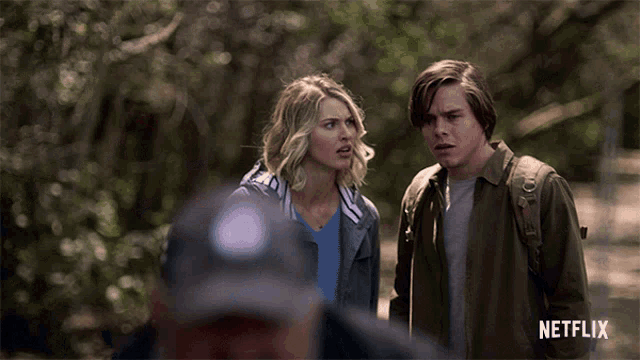 a man in a baseball cap is standing in front of a woman and a boy in a netflix ad