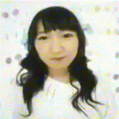a close up of a woman 's face with a white background