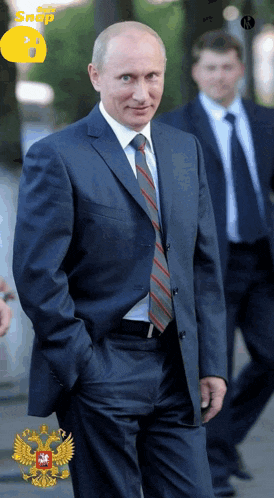 a man in a suit and tie with the word snap on the bottom