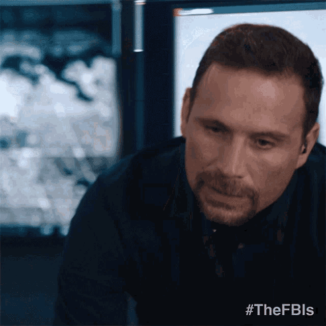 a close up of a man 's face with the hashtag #thefbls visible