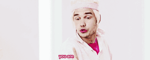 a man with blonde hair and a pink headband is saying you are perfect