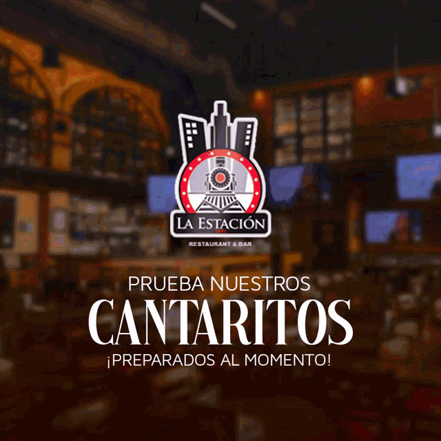 a person is preparing food in a restaurant with a sign that says la estacion