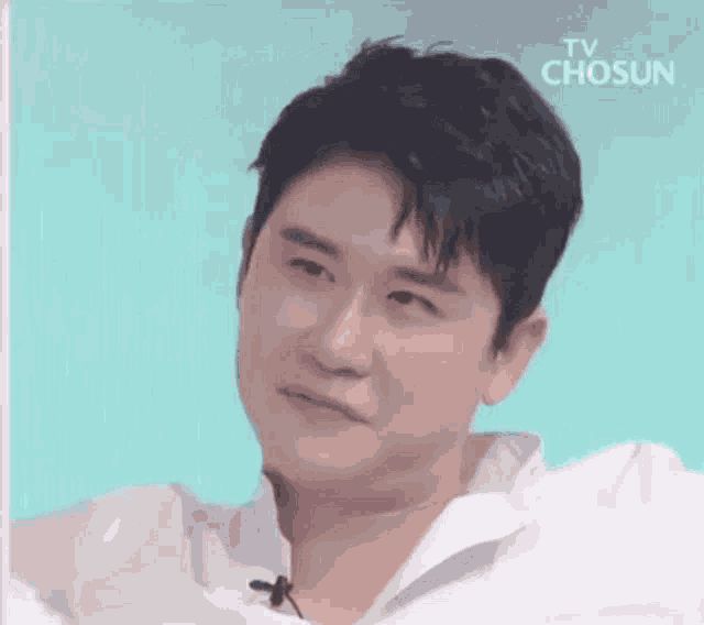 a close up of a man 's face with the words tv chosun on the bottom