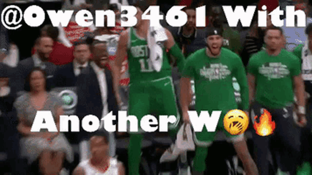 a basketball player in a green jersey with the number 11 on it