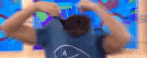 a pixelated image of a man flexing his muscles with a star trek logo on the back of his shirt