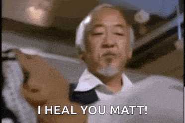 a man with a beard is holding a piece of paper and saying `` i heal you matt ! ''