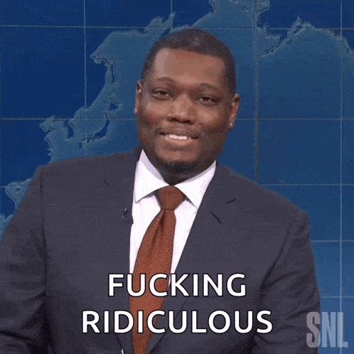 a man in a suit and tie says fucking ridiculous in front of a map