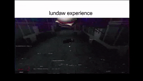 a giant hamburger is flying through the air in a dark room .