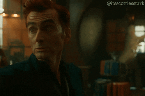 a man with red hair is screaming with the words ahh gabriel written below him