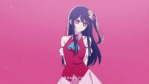a girl in a pink dress is holding two large pink hearts on her shoulders .
