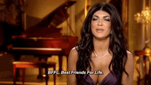 a woman is sitting in front of a piano and says bffl best friends for life